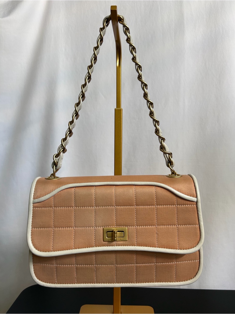 peach satin Chanel Chocolate Bar flap bag white trim and gold-tone hardware